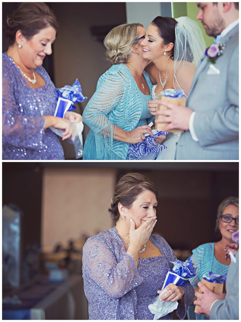 mothers receiving gifts from bride and groom
