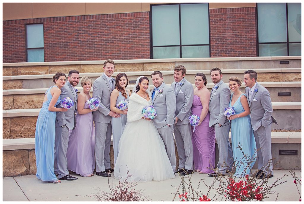 the bride and groom with their wedding party