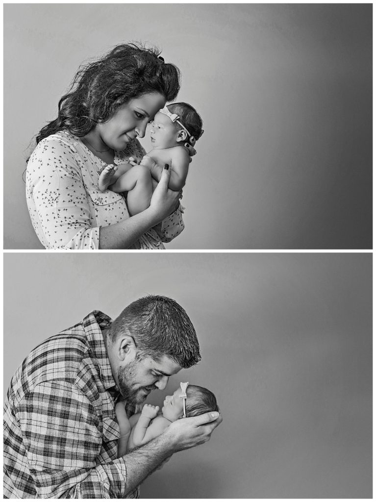 mom and dad with their newborn girl