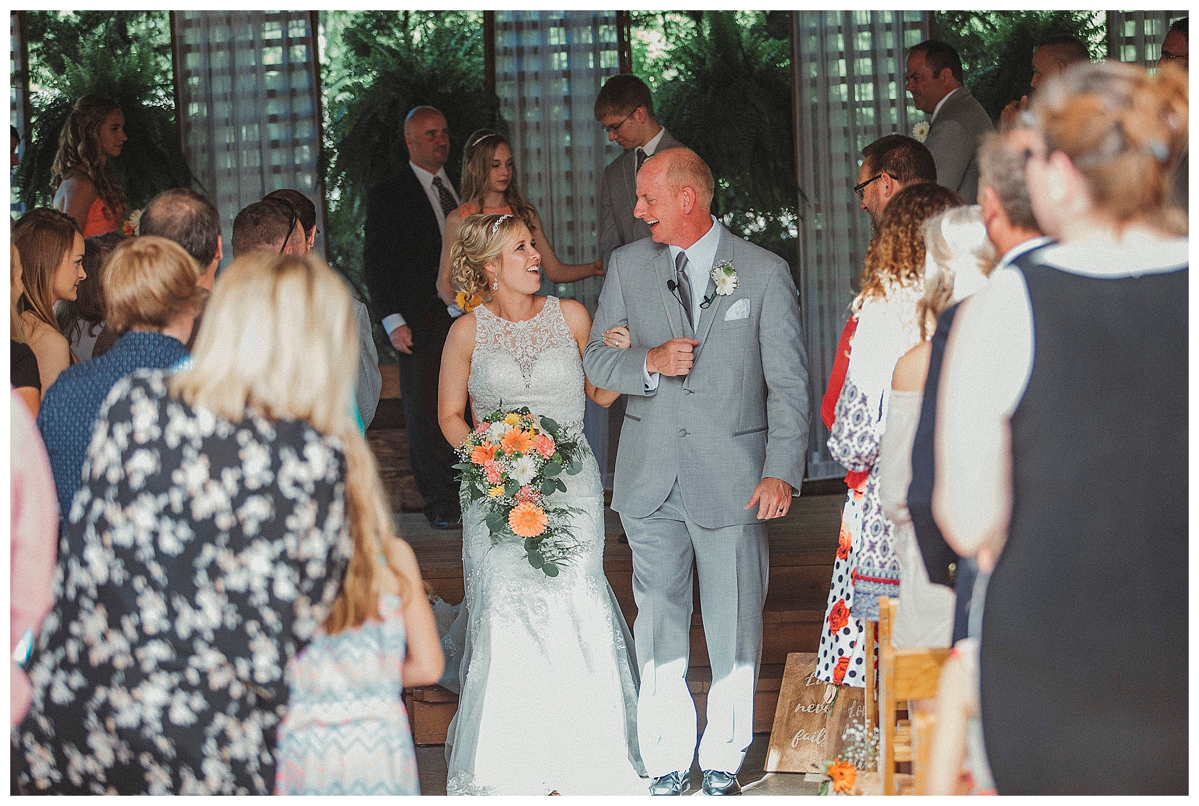 walking down the isle after the ceremony
