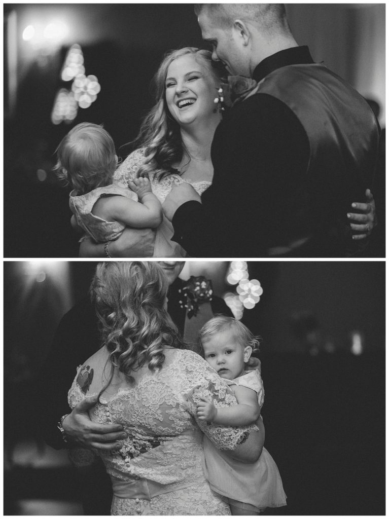 bride and groom dancing with their daughter