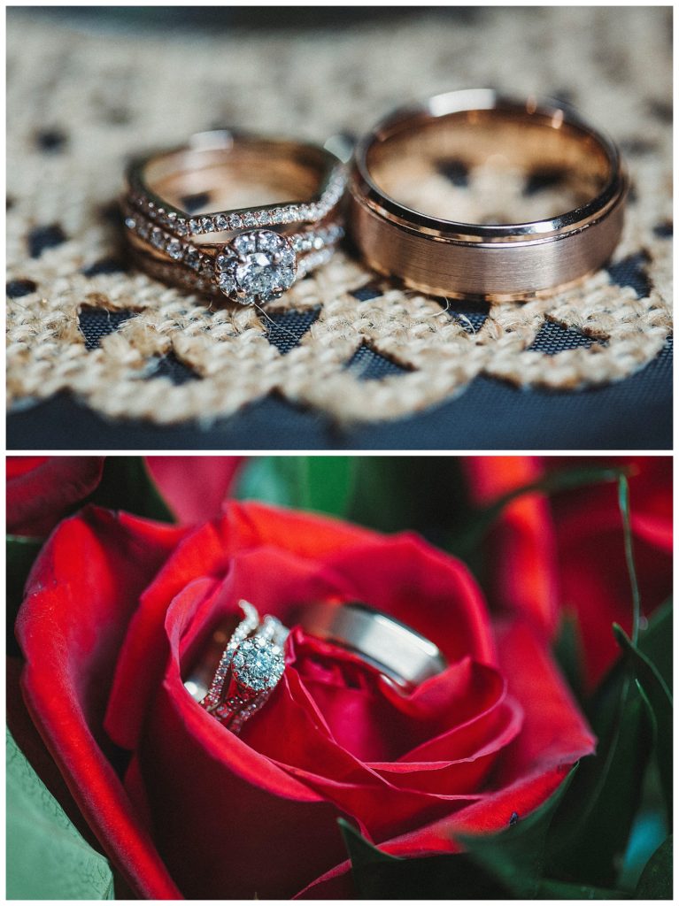 wedding rings on red roses