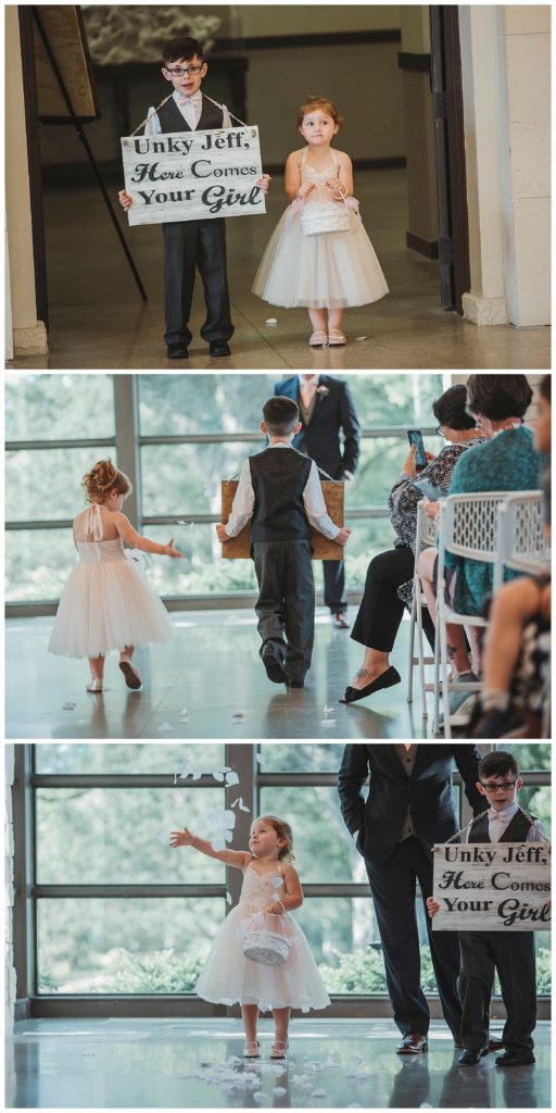 flower girl and ring bearer walking down the isle