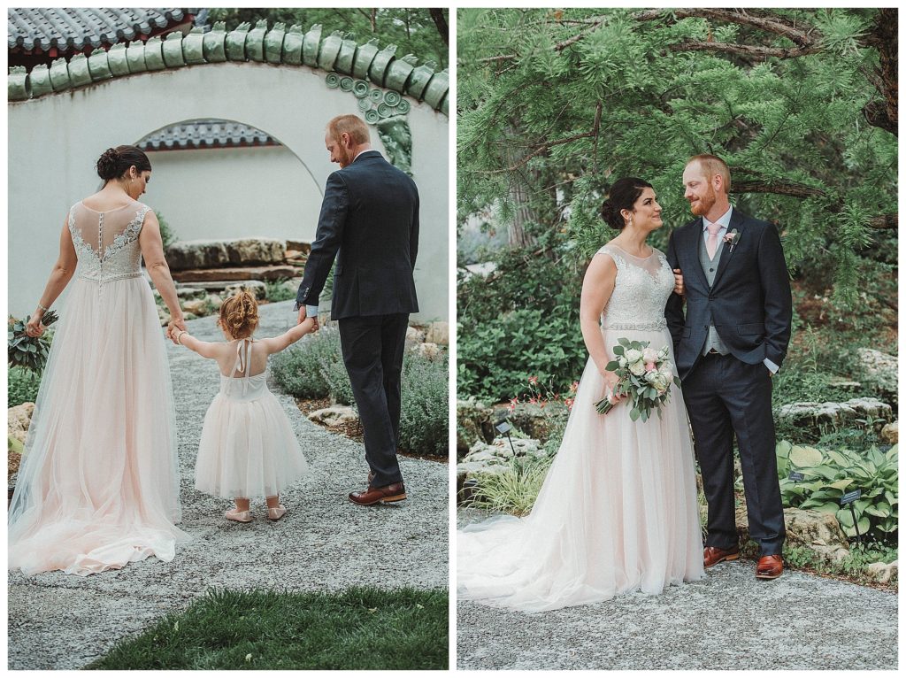 bride and groom with the flower girl