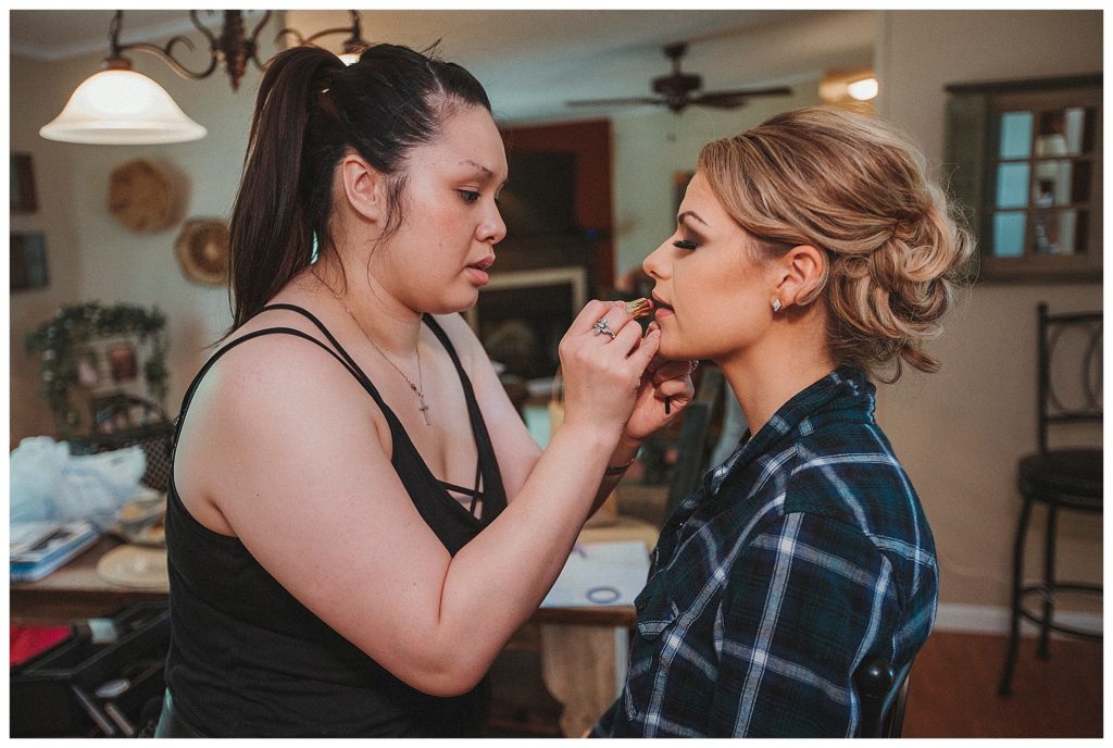 bride getting her makeup applied