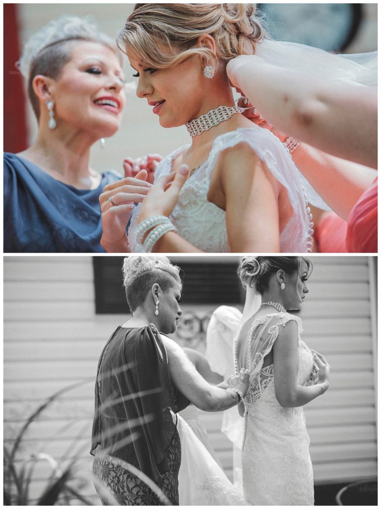 bride getting her dress buttoned