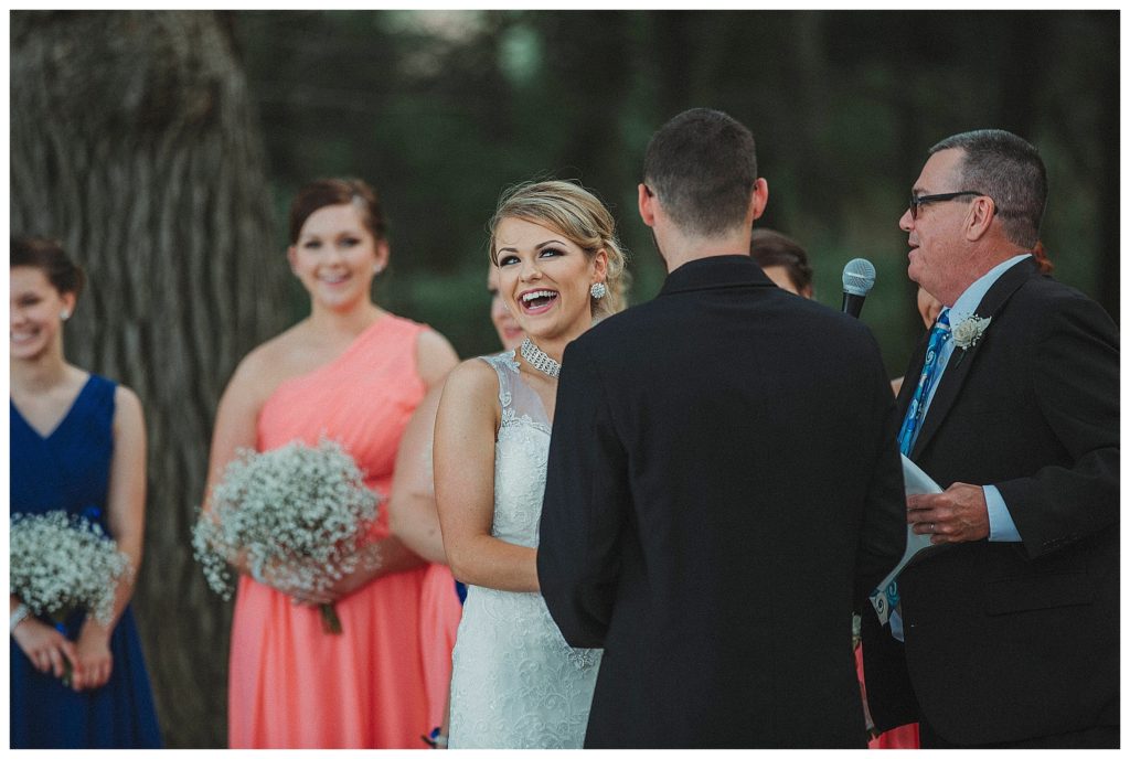bride laughing with her groom