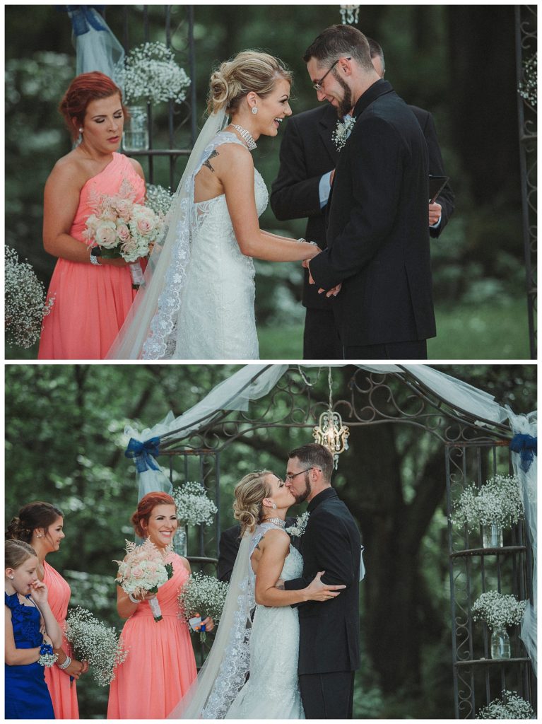 bride and groom kissing during ceremony