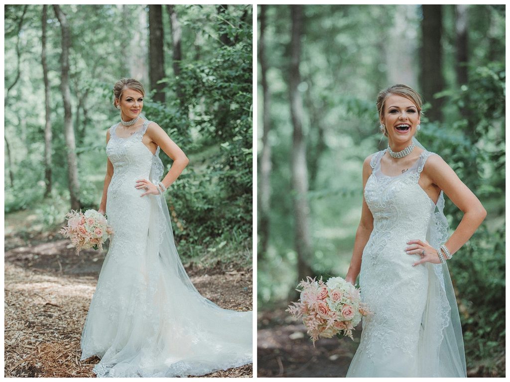 bride posing in the woods