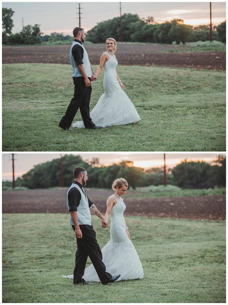 bride and groom walking at sunset