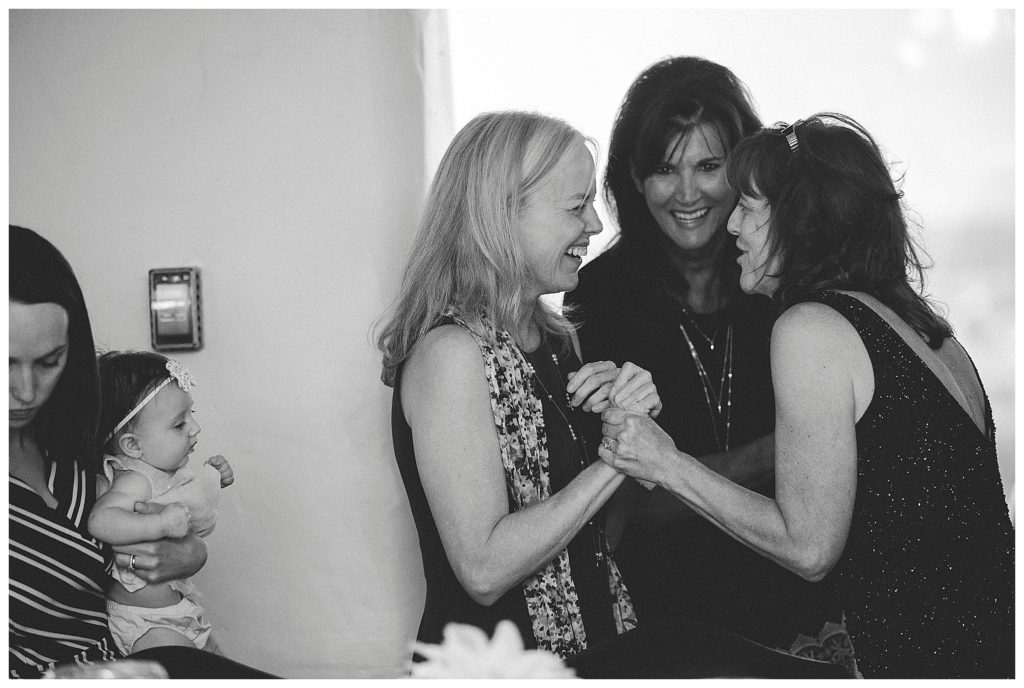 two women laughing together