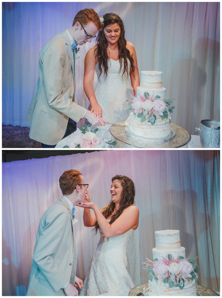 bride and groom feeding each other cake