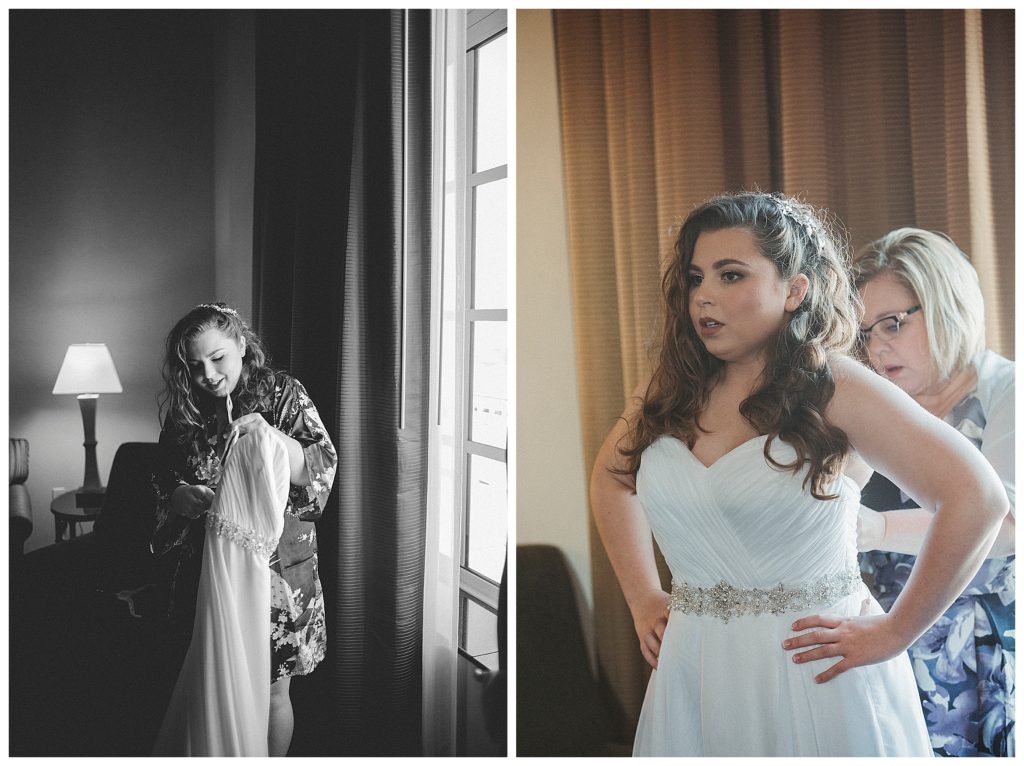 bride getting her dress on