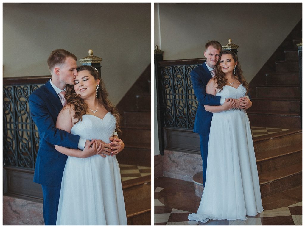 bride and groom posing in hotel lobby
