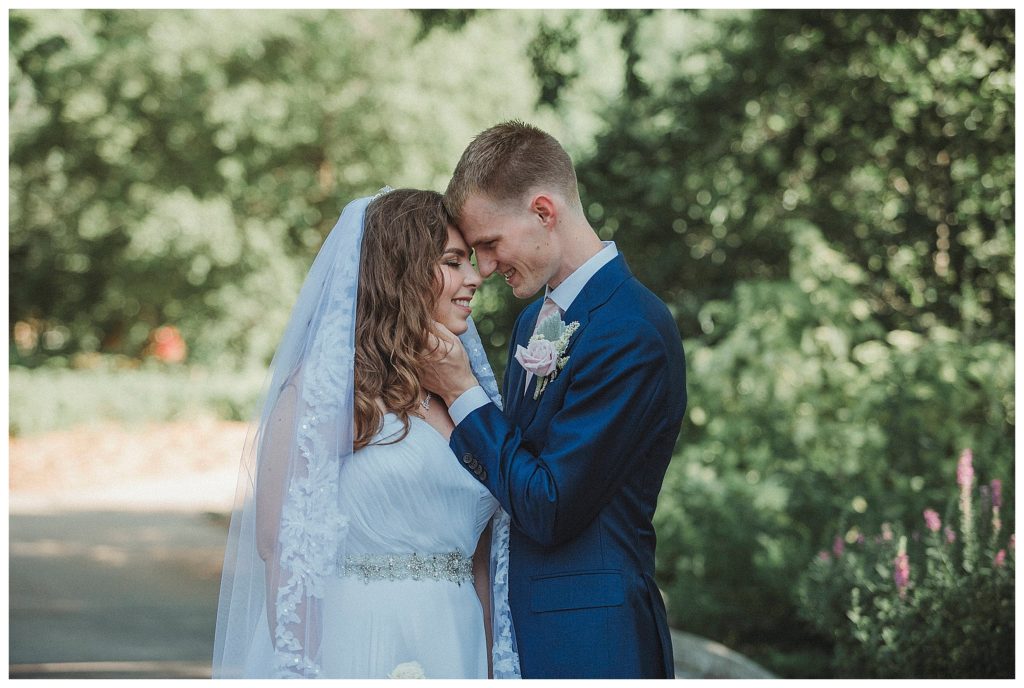 bride and groom in romantic pose