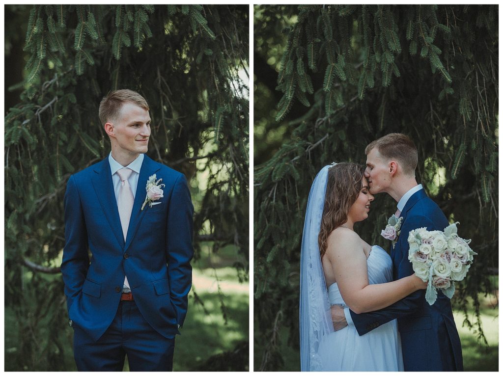 groom kissing his bride on the forehead