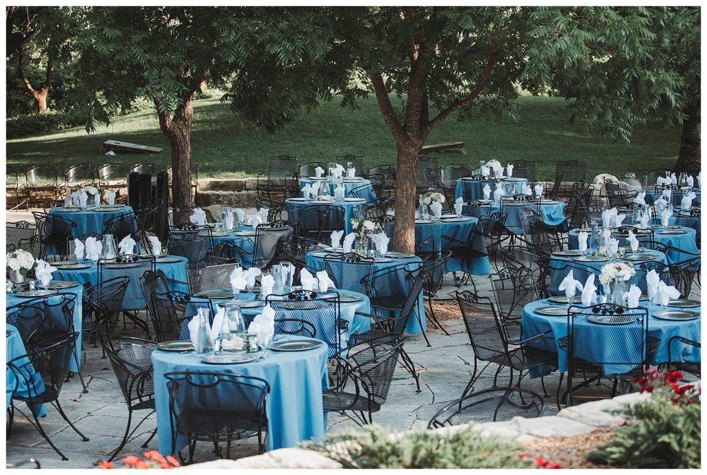 blue tables at outdoor reception