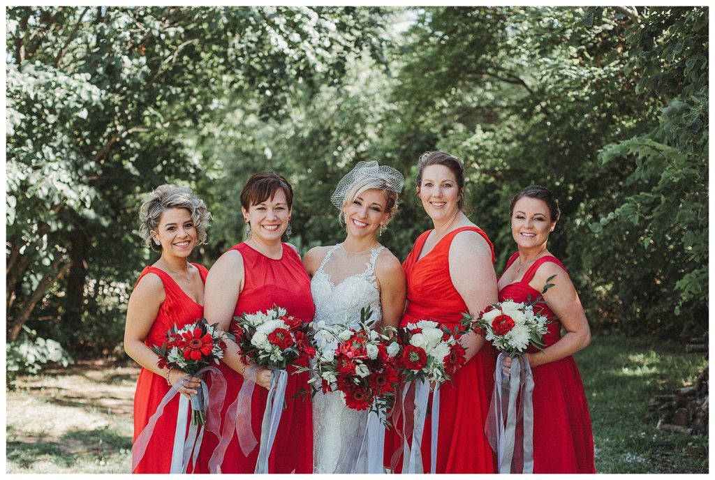 bride with her bridesmaids