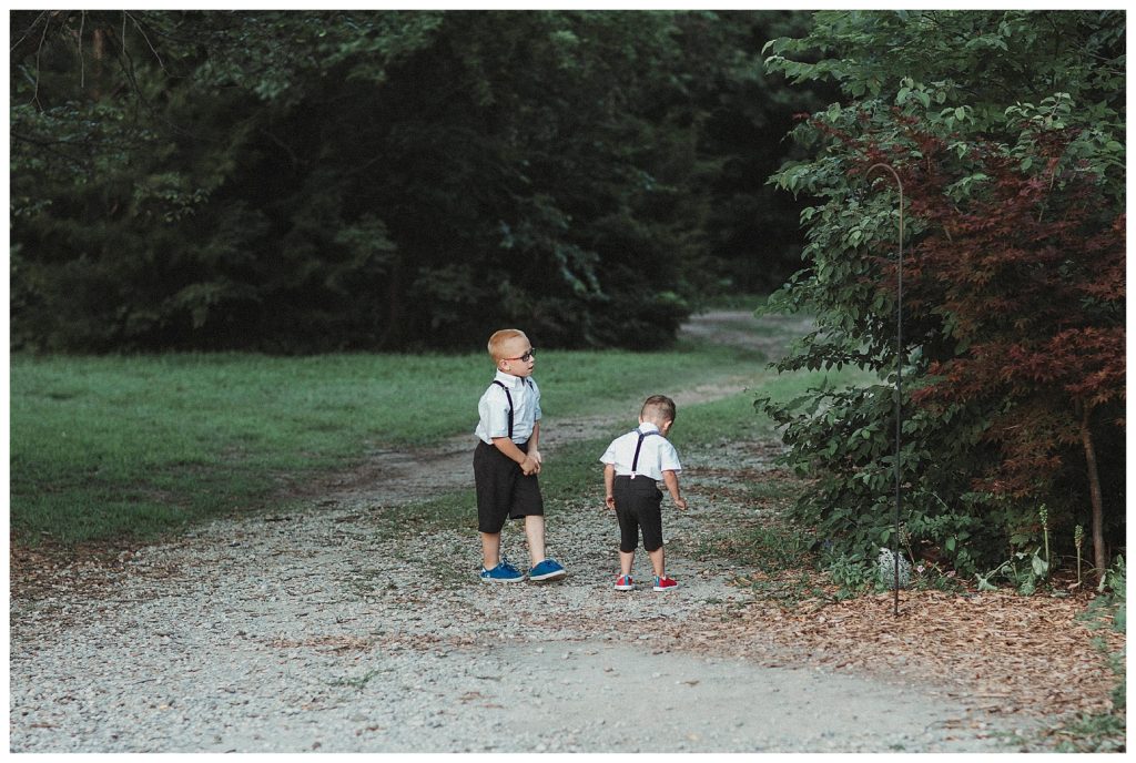 ring bearers playing in the yard