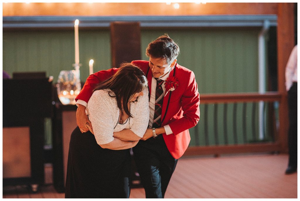 groom dancing with his mom