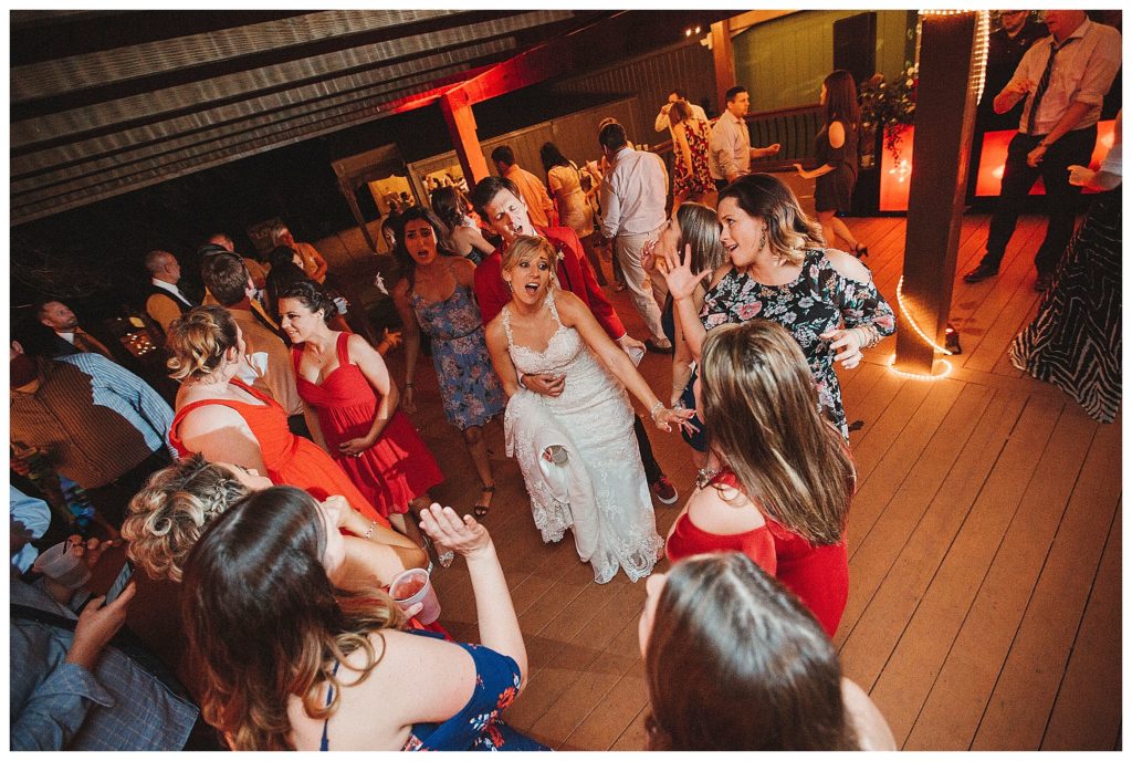 bride and groom dancing at their party
