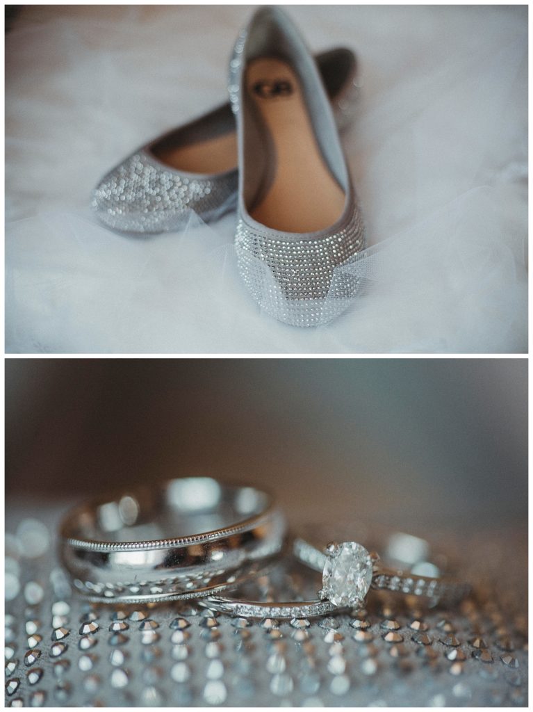 bridal shoes on veil and detail of wedding rings