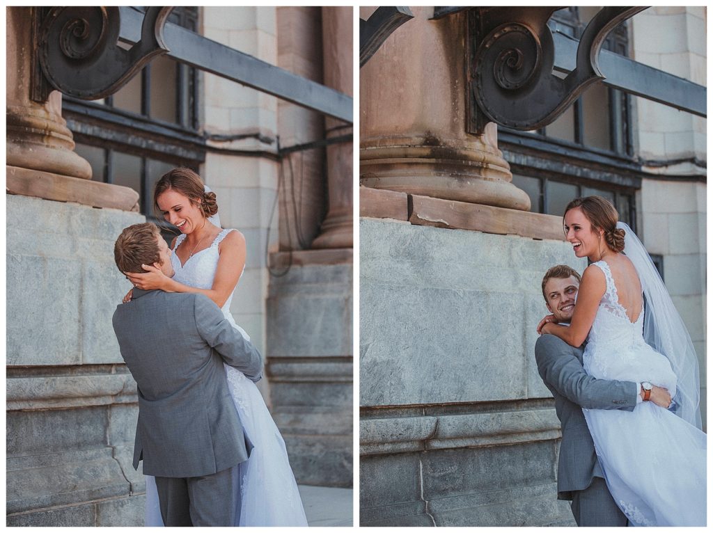 groom picking up his bride