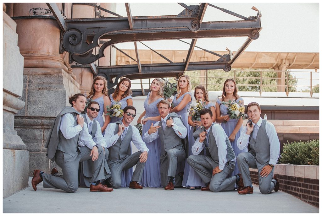 bridal party doing fun pose