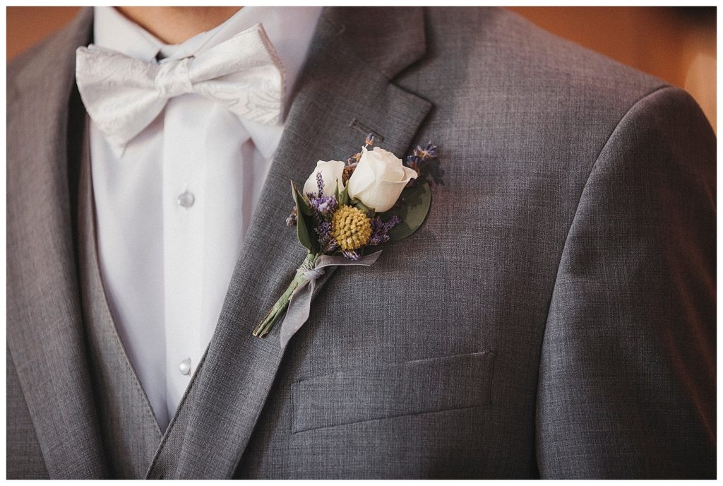grooms flower on jacket