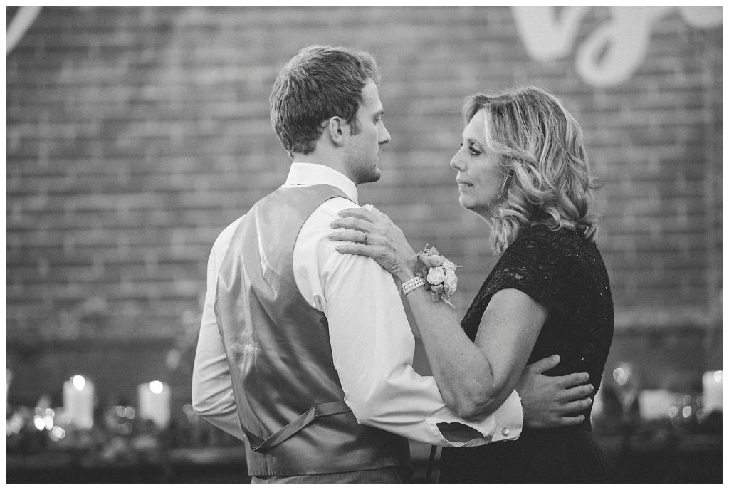groom dancing with is mother
