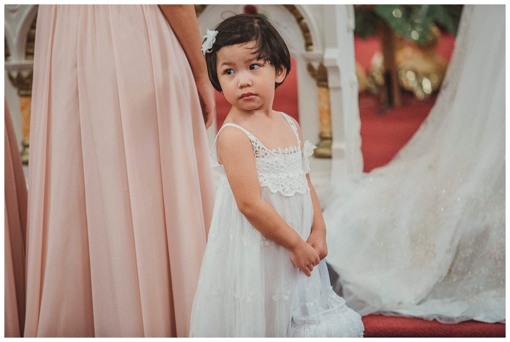 flower girl during catholic ceremony