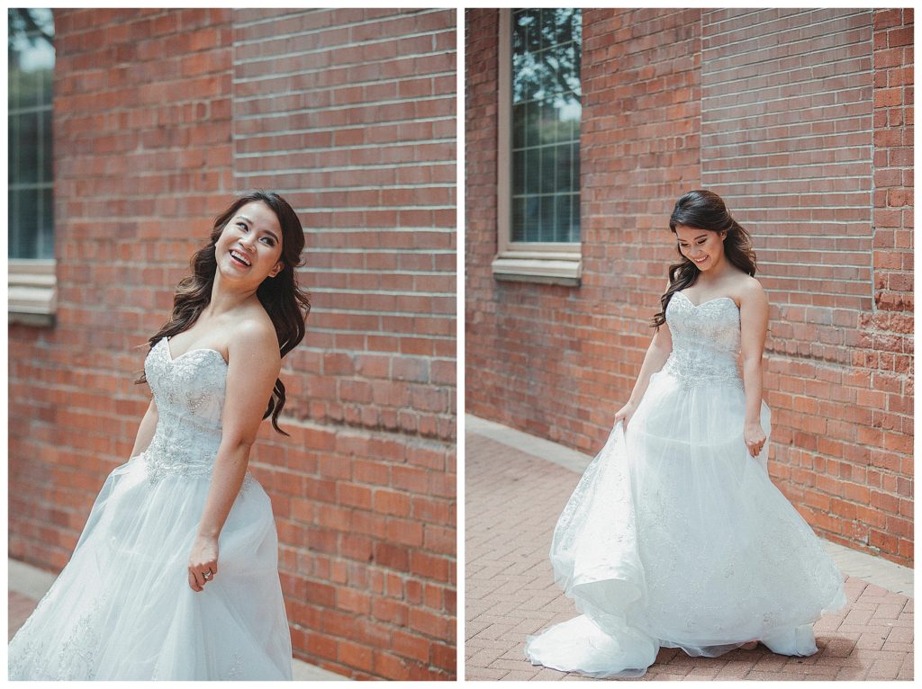 bride laughing while swinging her dress