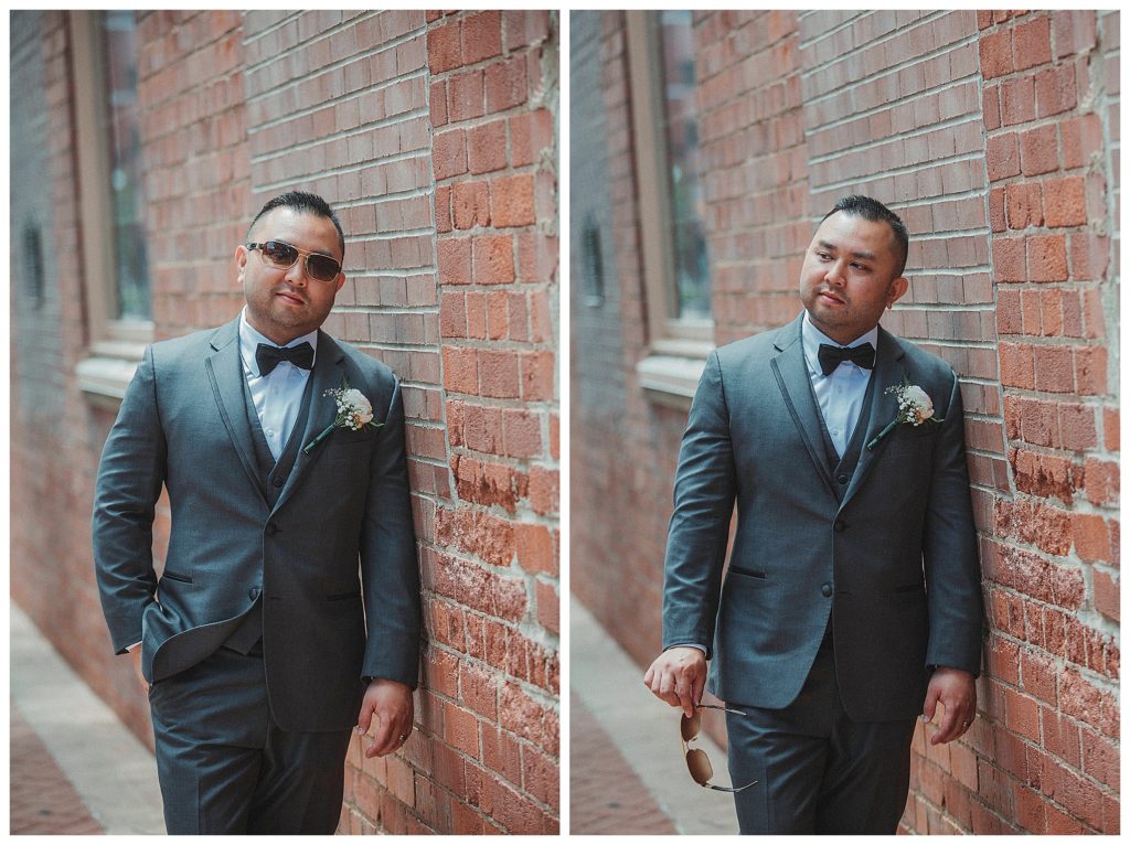 groom posing with his sun glasses