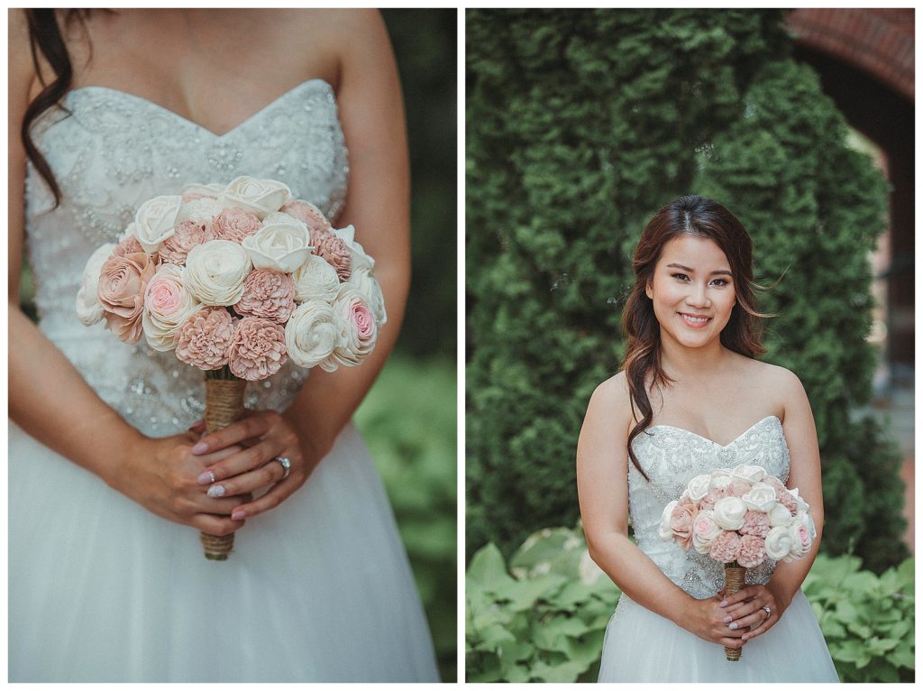 bride posing with her wooden flowers