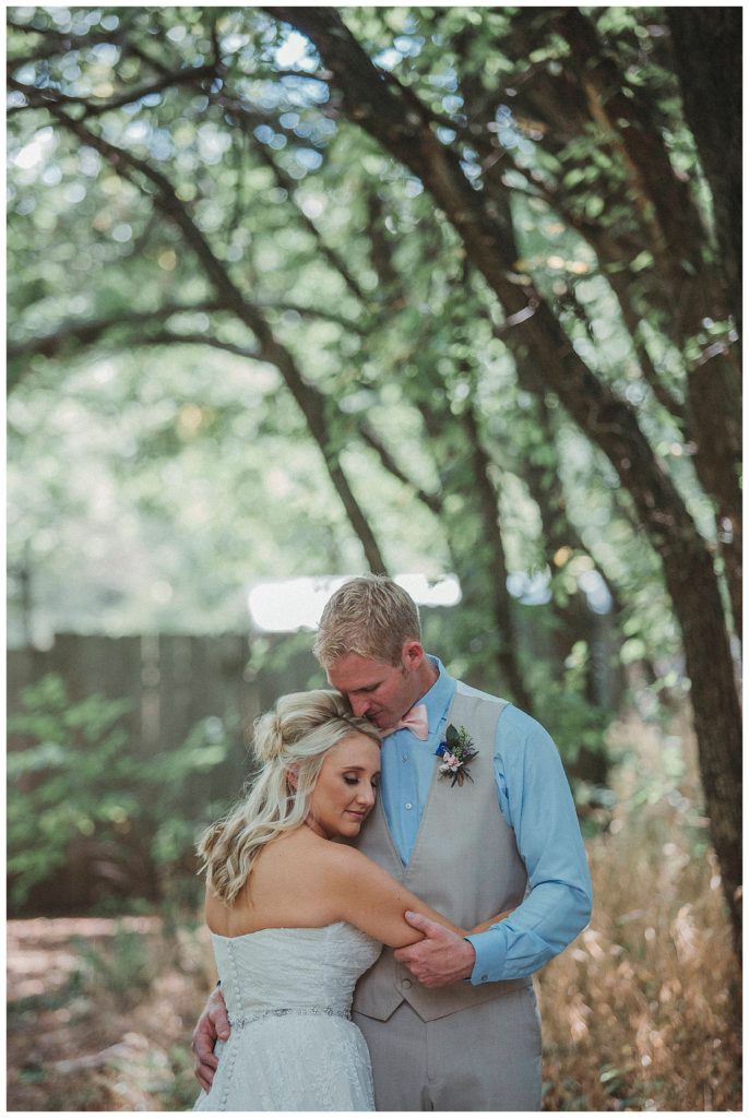 bride hugging her groom