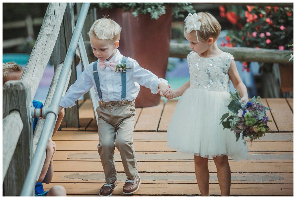ring bearer and flower girl entering ceremony