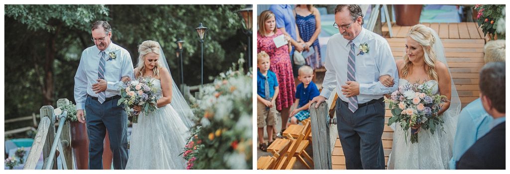 father walking daughter down the isle