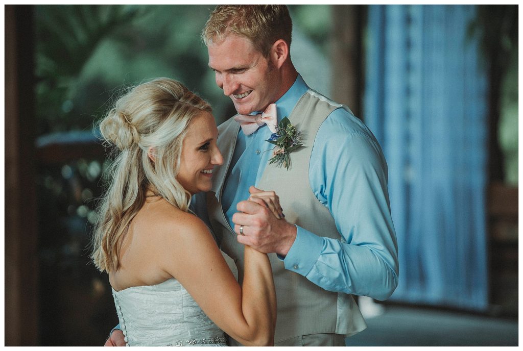 bride and groom dancing at reception
