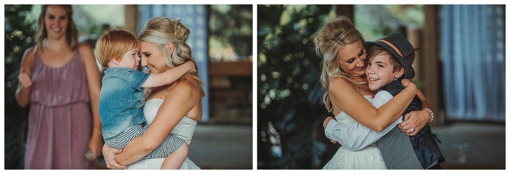 bride dancing with kids at reception
