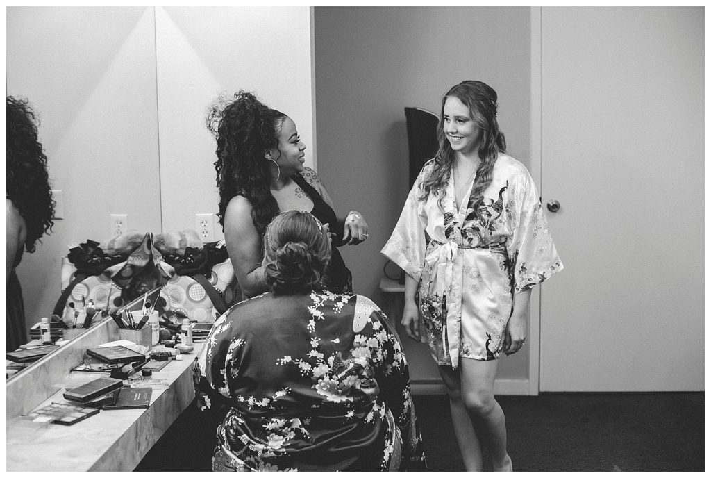 bride talking with hair stylist