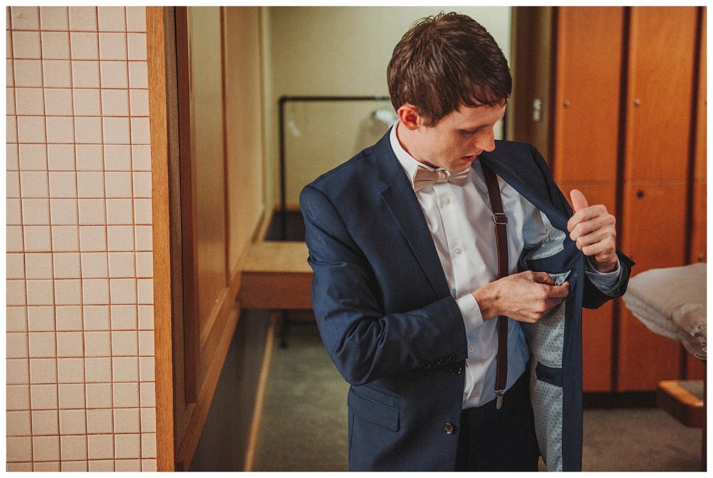 groom getting ready for wedding