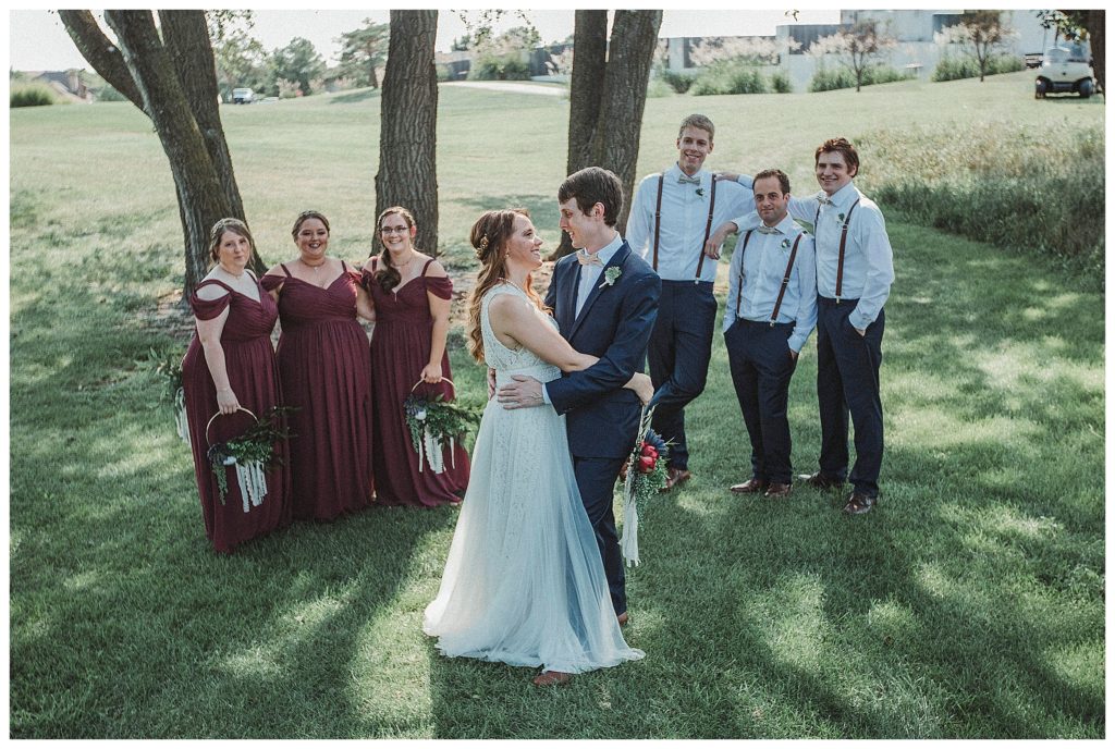 bride and groom with their bridal party