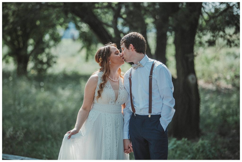 bride and groom kissing