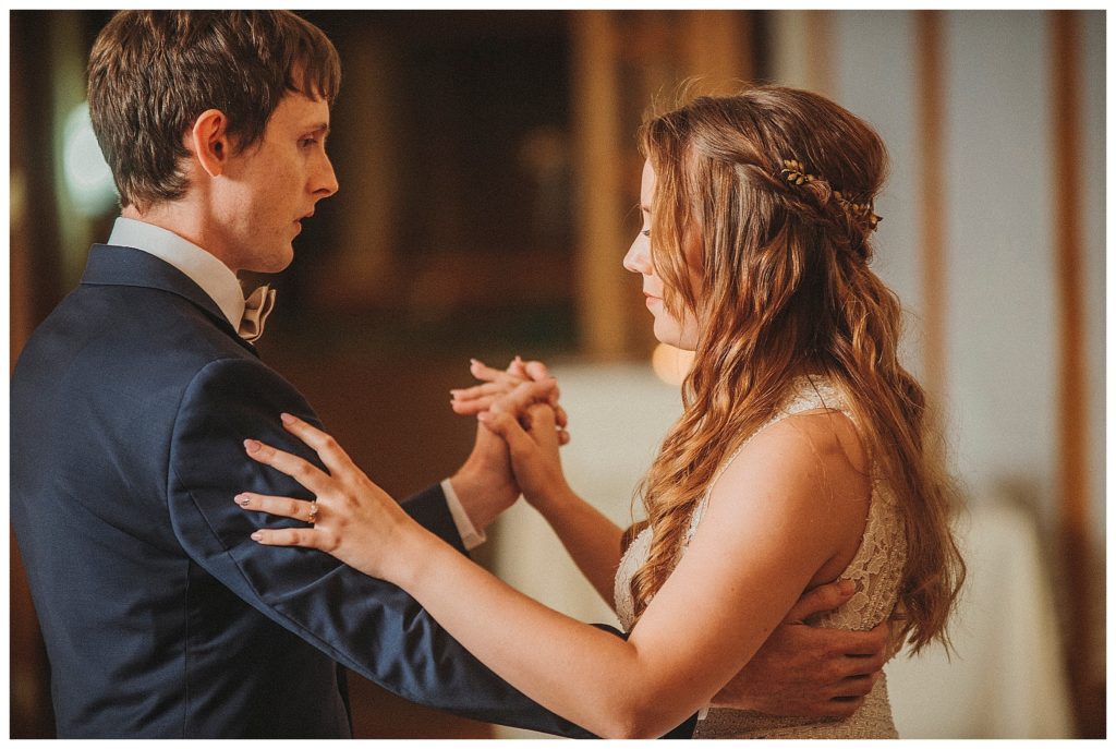 bride and groom dancing at reception