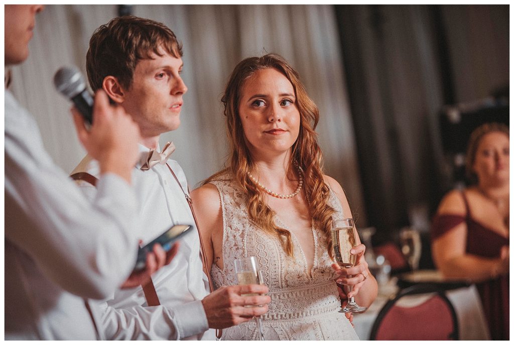 toasting to the bride and groom