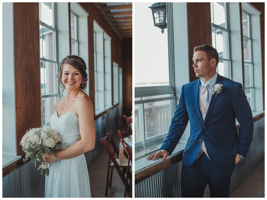 bride and groom standing near window