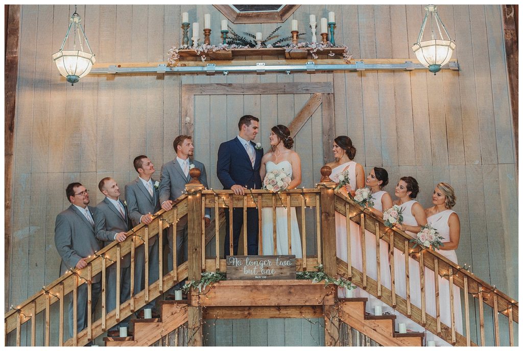 bridal party lined up on stairs
