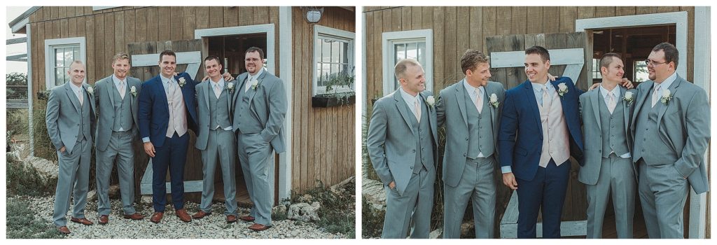 groom and groomsmen laughing together