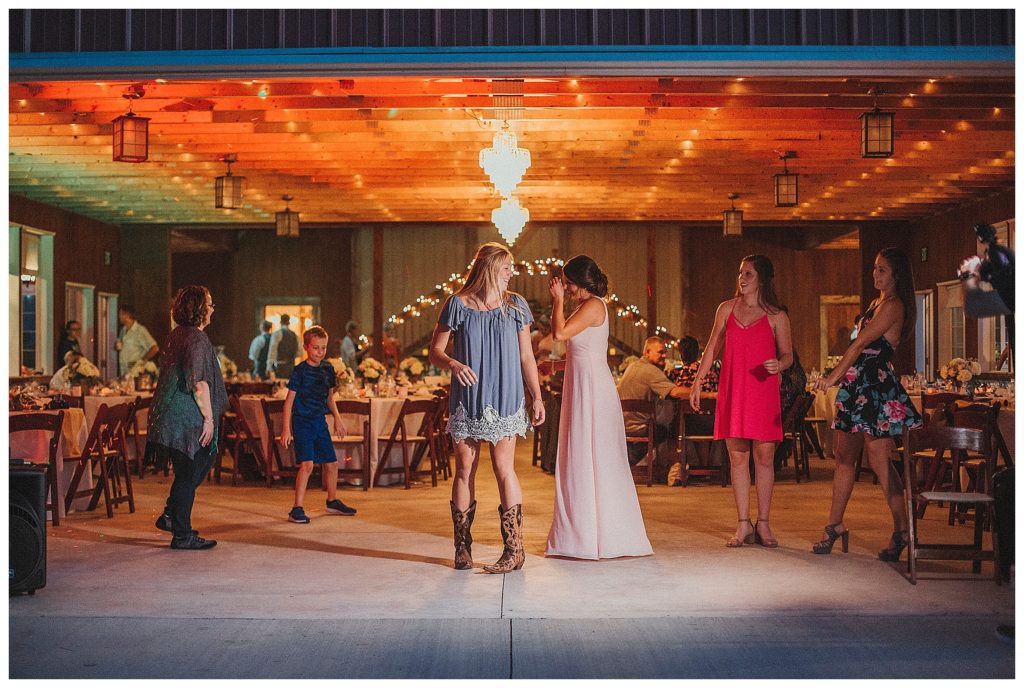 guests dancing in the barn