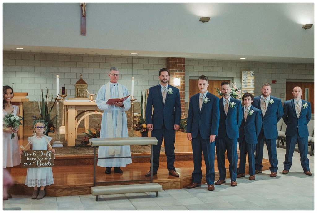 groom seeing his bride down the isle